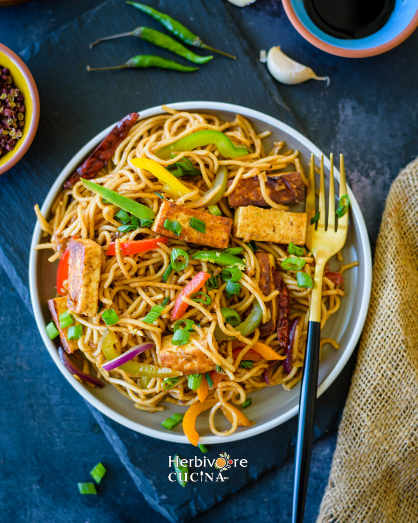 Chili Paneer Noodles in a plate