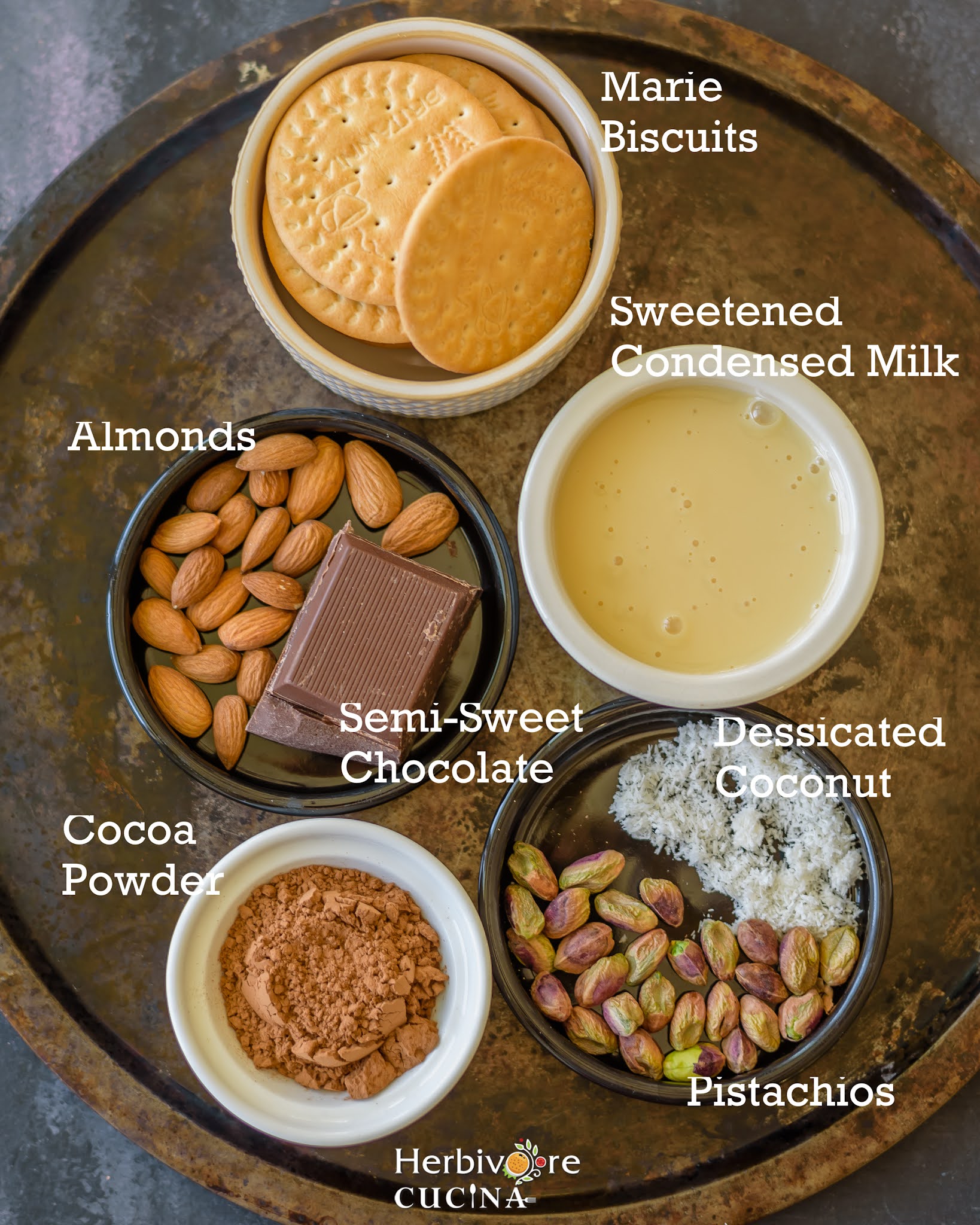Ingredients for Easy Marie Chocolate Truffles arranged on a tray in small bowls. 