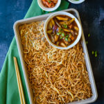 Air Fryer noodles in a tray with vegetables