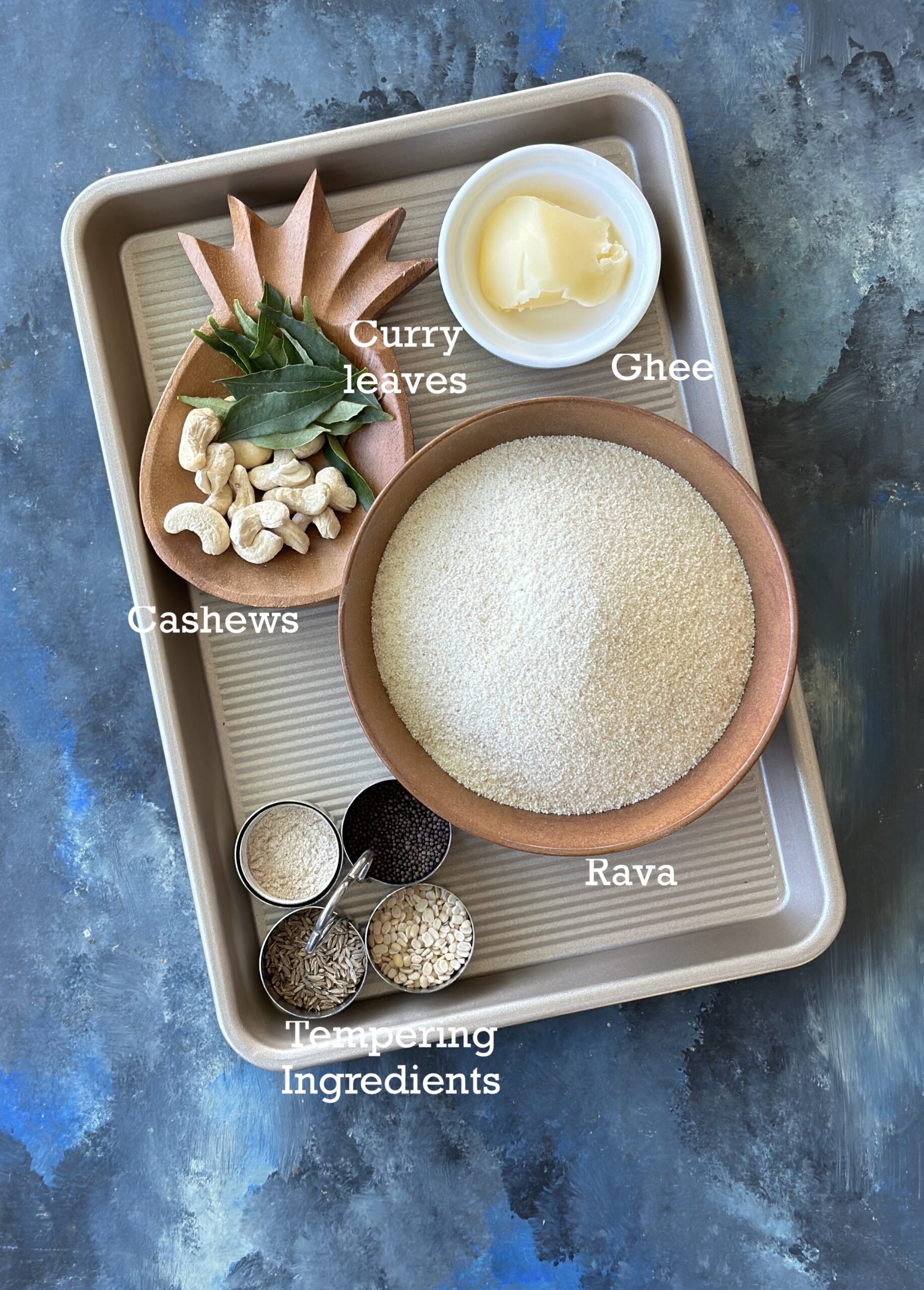 Ingredients for rava mixture; rava, ghee and tempering ingredients.