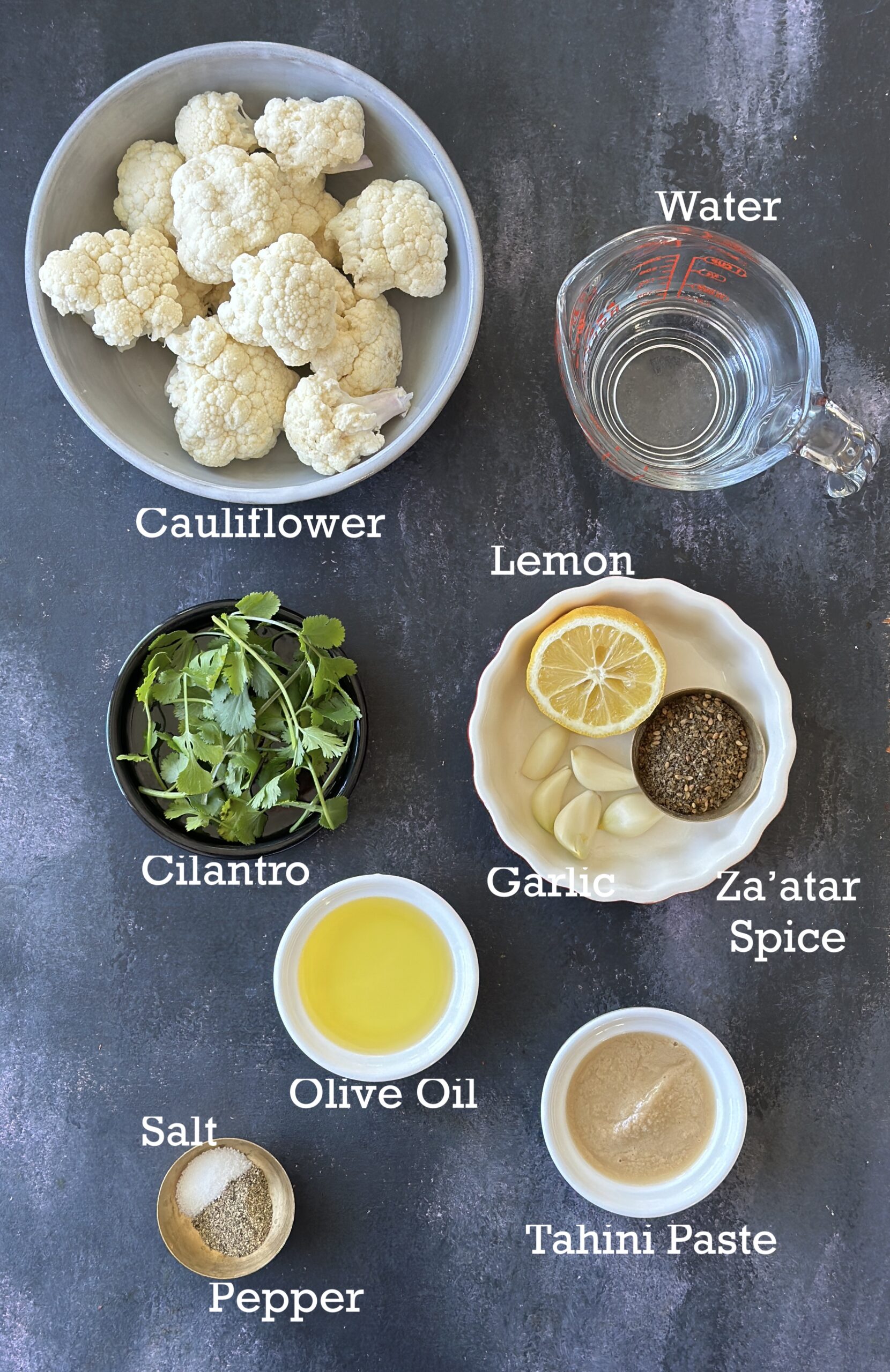 Air fryer tahini cauliflower ingredients; cauliflower, spices and tahini paste.