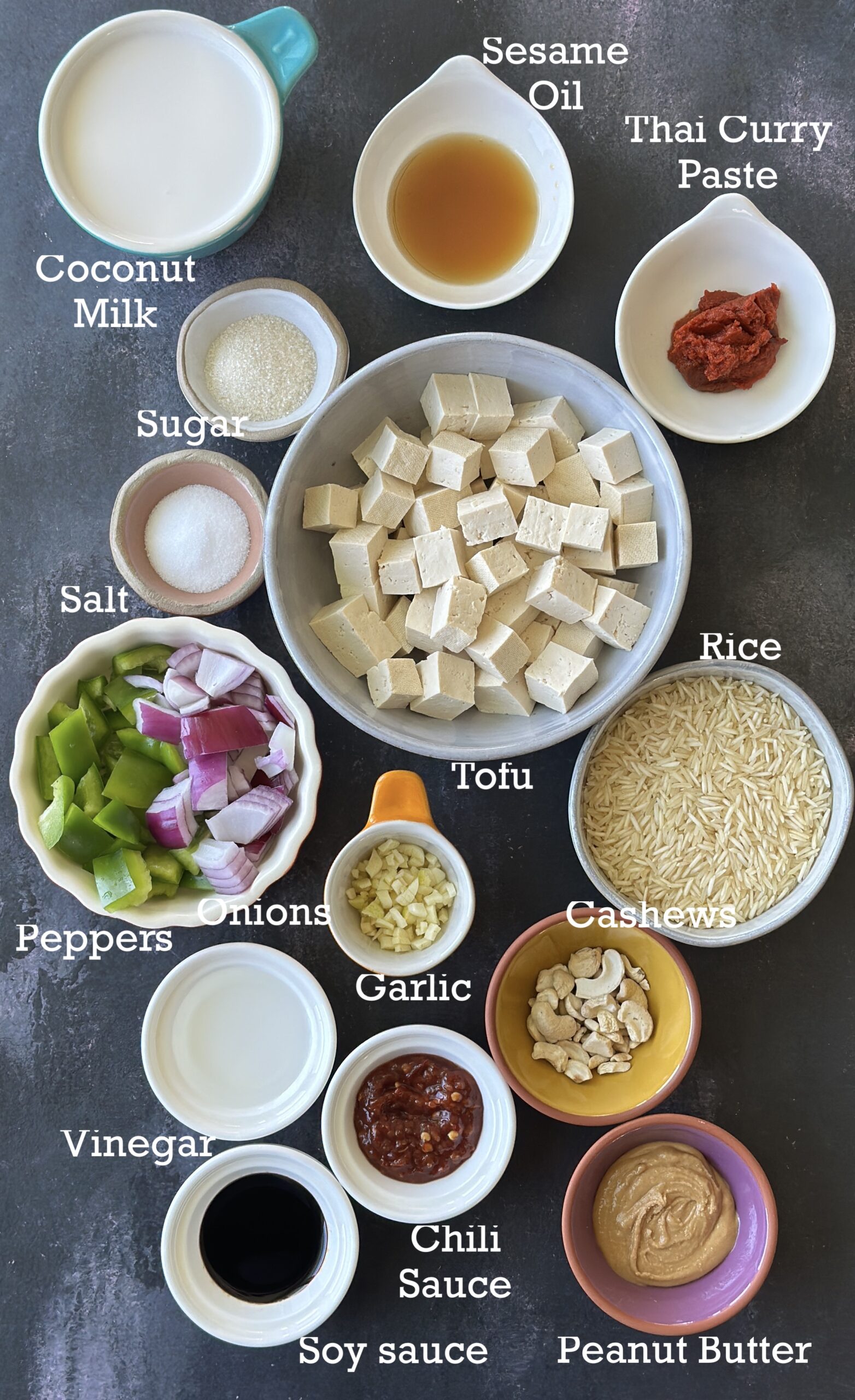Ingredients for Instant Pot Peanut Tofu and Rice; tofu, rice, seasonings and sauces. 